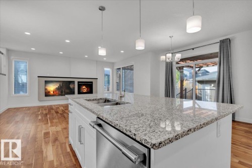 7142 May Cr, Edmonton, AB - Indoor Photo Showing Kitchen With Double Sink With Upgraded Kitchen