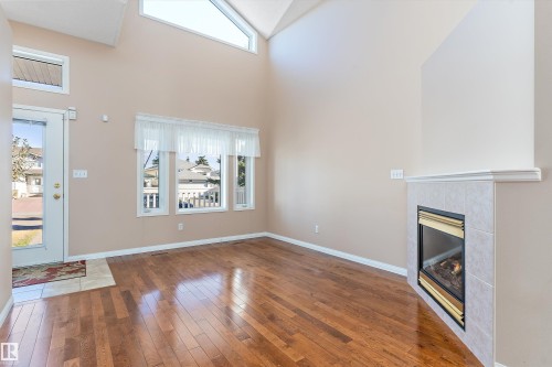 15028 128 Street, Edmonton, AB - Indoor Photo Showing Other Room With Fireplace