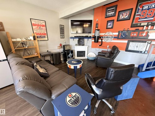 1186 Genesis Lake Boulevard, Stony Plain, AB - Indoor Photo Showing Other Room With Fireplace