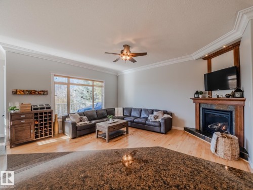 5204 63 Street, Beaumont, AB - Indoor Photo Showing Living Room With Fireplace