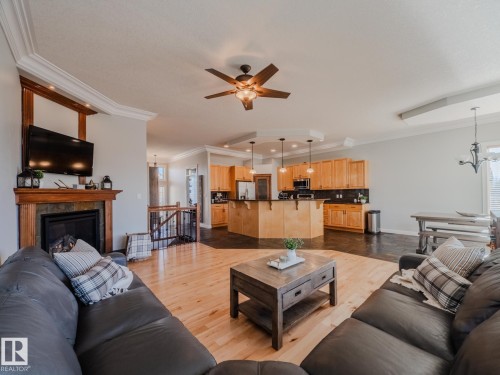 5204 63 Street, Beaumont, AB - Indoor Photo Showing Living Room With Fireplace