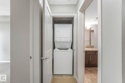210 103 Ambleside Drive, Edmonton, AB - Indoor Photo Showing Laundry Room