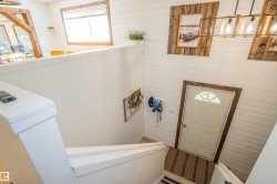 Foyer entrance with wood walls - 
