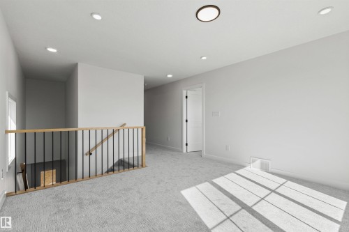 Carpeted empty room featuring recessed lighting and baseboards - 3331 Chickadee Drive, Edmonton, AB - Indoor