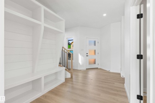 Mudroom with light wood-style floors and recessed lighting - 3331 Chickadee Drive, Edmonton, AB - Indoor Photo Showing Other Room