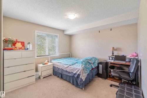 210 530 Watt Boulevard, Edmonton, AB - Indoor Photo Showing Bedroom