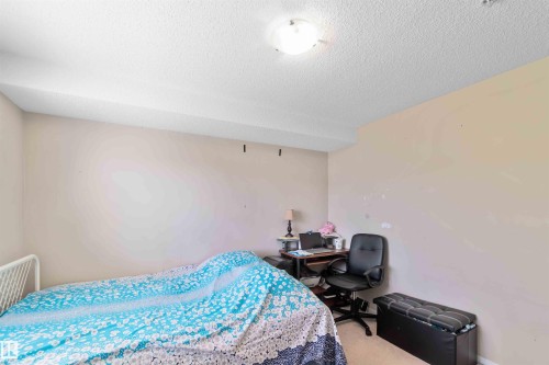 210 530 Watt Boulevard, Edmonton, AB - Indoor Photo Showing Bedroom