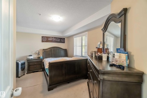 210 530 Watt Boulevard, Edmonton, AB - Indoor Photo Showing Bedroom