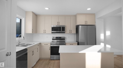 2 3705 141 Street, Edmonton, AB - Indoor Photo Showing Kitchen With Double Sink With Upgraded Kitchen