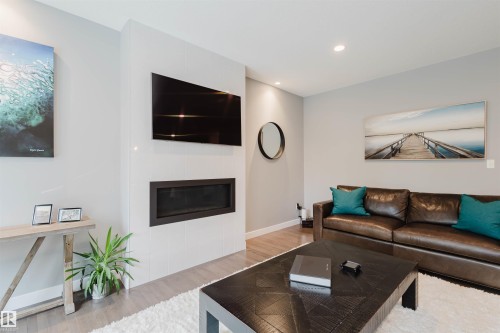 2117 69A Street, Edmonton, AB - Indoor Photo Showing Living Room With Fireplace