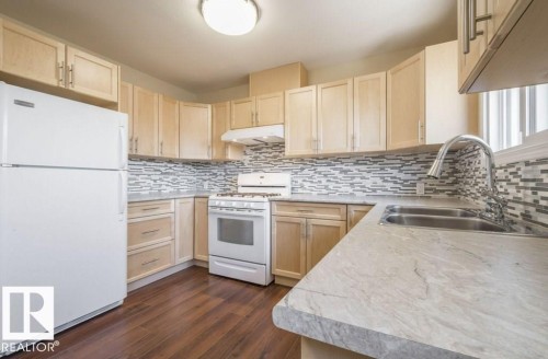 12807 135 Avenue, Edmonton, AB - Indoor Photo Showing Kitchen With Double Sink