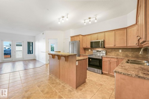 232 1406 Hodgson Way, Edmonton, AB - Indoor Photo Showing Kitchen With Double Sink