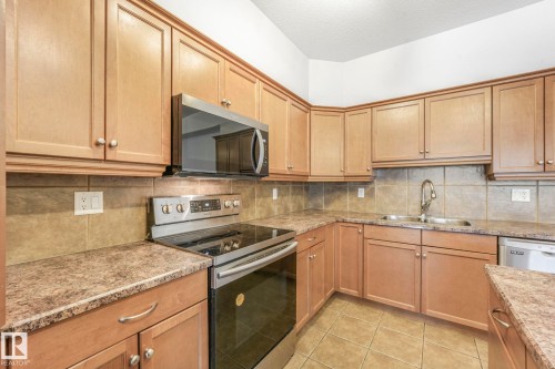 232 1406 Hodgson Way, Edmonton, AB - Indoor Photo Showing Kitchen With Double Sink
