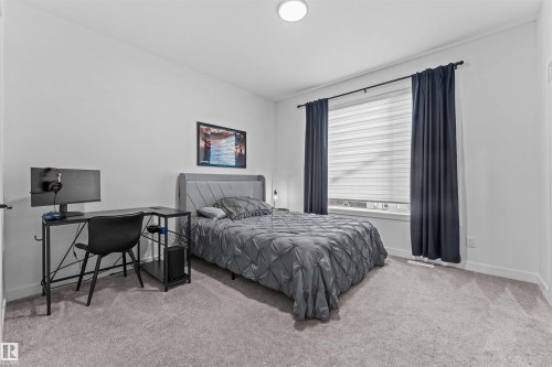 57 Dalquist Bay, Leduc, AB - Indoor Photo Showing Bedroom