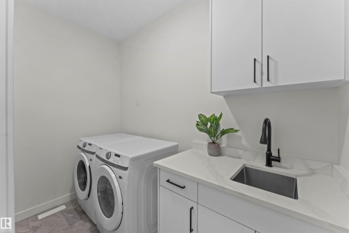 57 Dalquist Bay, Leduc, AB - Indoor Photo Showing Laundry Room