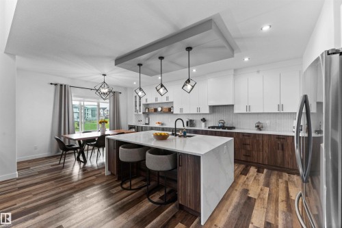 57 Dalquist Bay, Leduc, AB - Indoor Photo Showing Kitchen With Upgraded Kitchen