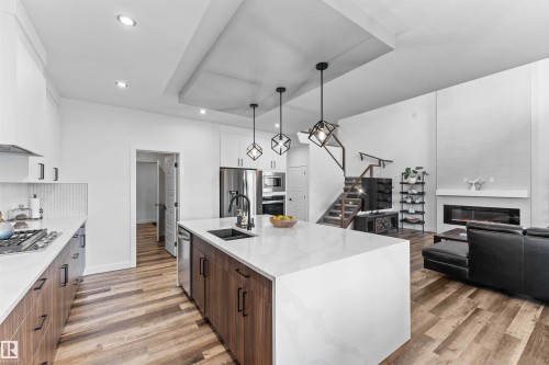 57 Dalquist Bay, Leduc, AB - Indoor Photo Showing Kitchen With Upgraded Kitchen
