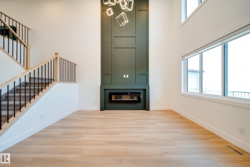 125 Starling Way, Fort Saskatchewan, AB - Indoor Photo Showing Other Room With Fireplace