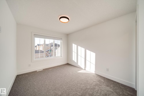 125 Starling Way, Fort Saskatchewan, AB - Indoor Photo Showing Other Room