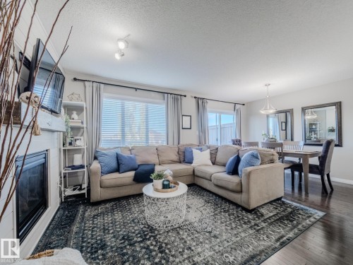 1692 Chapman Way, Edmonton, AB - Indoor Photo Showing Living Room With Fireplace