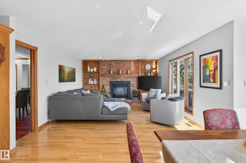 24 Valleyview Crescent, Rural Sturgeon County, AB - Indoor Photo Showing Living Room With Fireplace