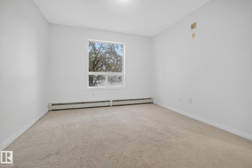 1124 330 Clareview Station Drive, Edmonton, AB - Indoor Photo Showing Other Room