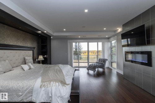 14 3466 Keswick Boulevard, Edmonton, AB - Indoor Photo Showing Bedroom With Fireplace