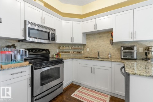 202 10524 77 Avenue, Edmonton, AB - Indoor Photo Showing Kitchen With Double Sink