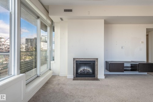301 2606 109 Street, Edmonton, AB - Indoor Photo Showing Other Room With Fireplace