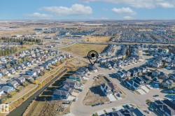 Aerial overview of property's location with nearby suburban area - 