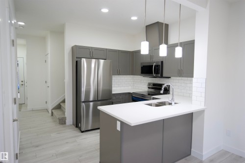 12 2710 66 Street, Edmonton, AB - Indoor Photo Showing Kitchen With Double Sink With Upgraded Kitchen