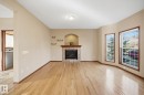 1922 Tanner Wynd, Edmonton, AB  - Indoor Photo Showing Living Room With Fireplace 