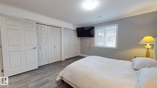 4 4548 Madsen Avenue, Drayton Valley, AB - Indoor Photo Showing Bedroom