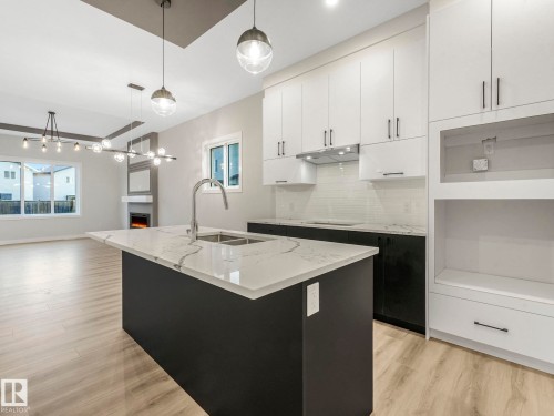 36 Dalquist Bay, Leduc, AB - Indoor Photo Showing Kitchen With Double Sink With Upgraded Kitchen