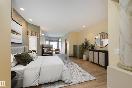 96 Linksview Drive, Spruce Grove, AB - Indoor Photo Showing Bedroom With Fireplace
