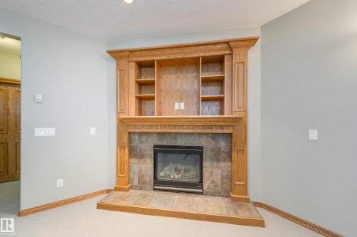 96 Linksview Drive, Spruce Grove, AB - Indoor Photo Showing Living Room With Fireplace