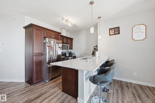411 304 Ambleside Link Link, Edmonton, AB - Indoor Photo Showing Kitchen With Stainless Steel Kitchen