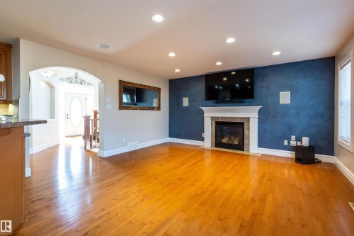 4224 157 Av, Edmonton, AB - Indoor Photo Showing Living Room With Fireplace