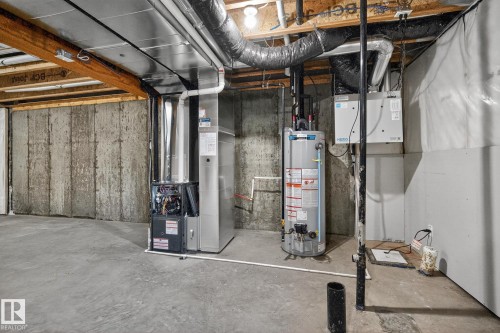 5 5122 213A Street, Edmonton, AB - Indoor Photo Showing Basement