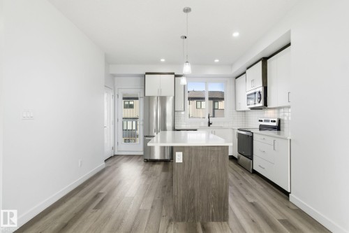 22764 97 Av Secord, Edmonton, AB - Indoor Photo Showing Kitchen With Stainless Steel Kitchen With Upgraded Kitchen