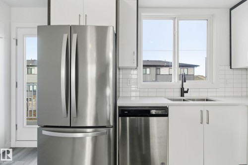 22764 97 Av Secord, Edmonton, AB - Indoor Photo Showing Kitchen With Stainless Steel Kitchen With Double Sink