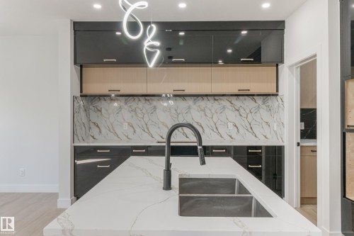 15012 15 Street, Edmonton, AB - Indoor Photo Showing Kitchen With Double Sink With Upgraded Kitchen