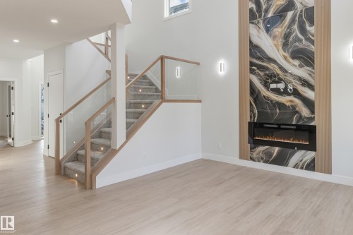15012 15 Street, Edmonton, AB - Indoor Photo Showing Other Room With Fireplace