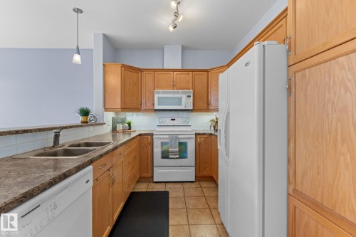 302 2503 Hanna Crescent, Edmonton, AB - Indoor Photo Showing Kitchen With Double Sink