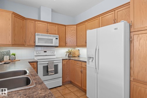 302 2503 Hanna Crescent, Edmonton, AB - Indoor Photo Showing Kitchen With Double Sink
