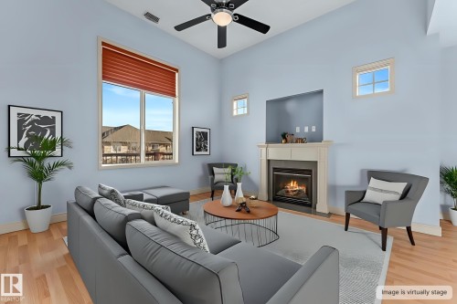 302 2503 Hanna Crescent, Edmonton, AB - Indoor Photo Showing Living Room With Fireplace