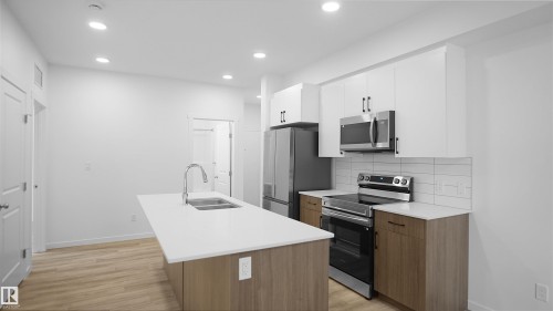 203 9219 228 Street, Edmonton, AB - Indoor Photo Showing Kitchen With Double Sink With Upgraded Kitchen