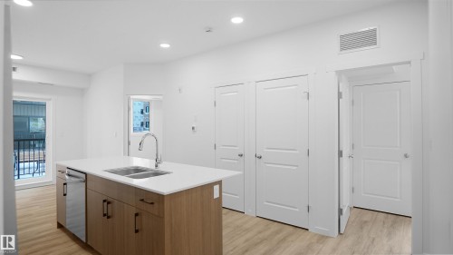 203 9219 228 Street, Edmonton, AB - Indoor Photo Showing Kitchen With Double Sink
