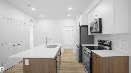 203 9219 228 Street, Edmonton, AB - Indoor Photo Showing Kitchen With Double Sink With Upgraded Kitchen