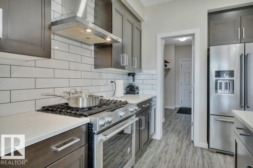 2320 Chokecherry Close, Edmonton, AB - Indoor Photo Showing Kitchen With Upgraded Kitchen